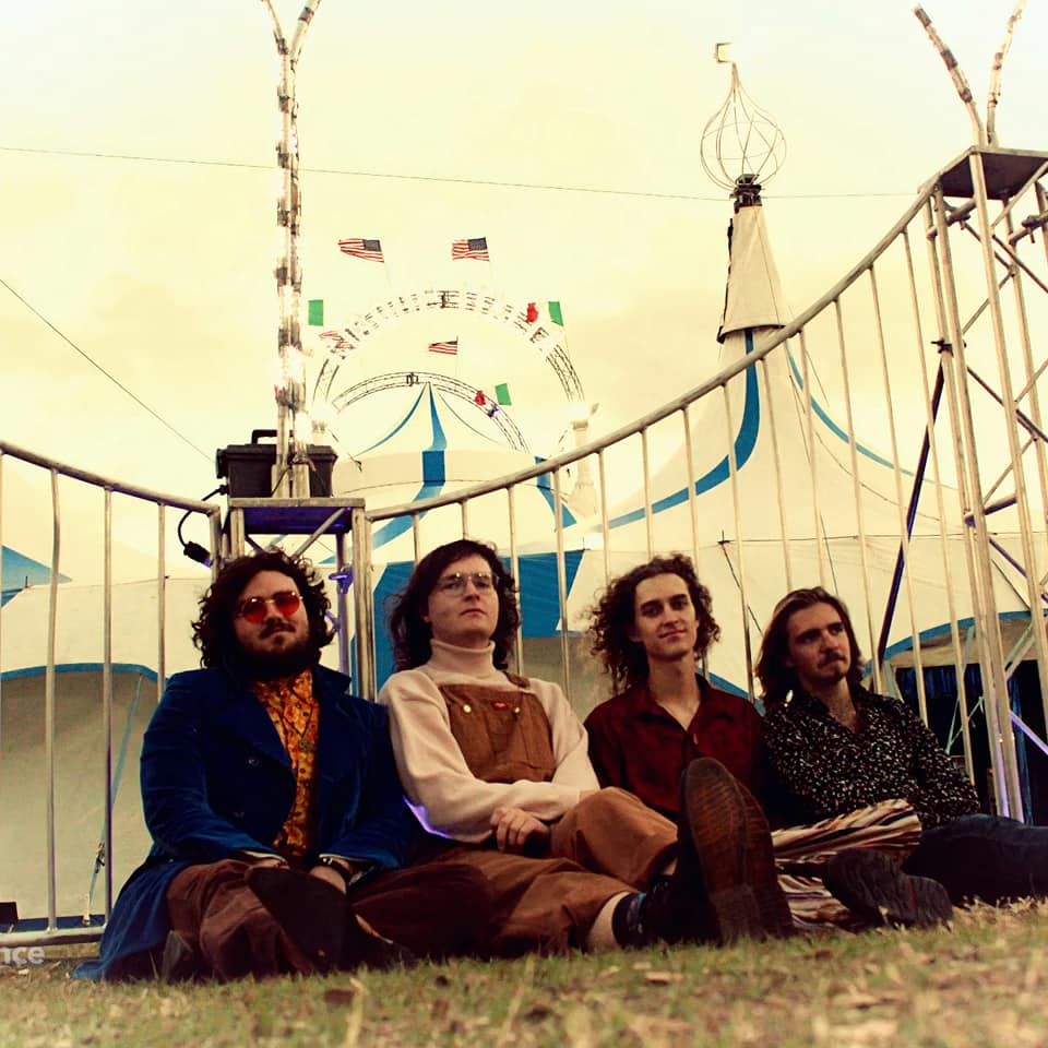 Humble Fish on the road — band in front of VW bus